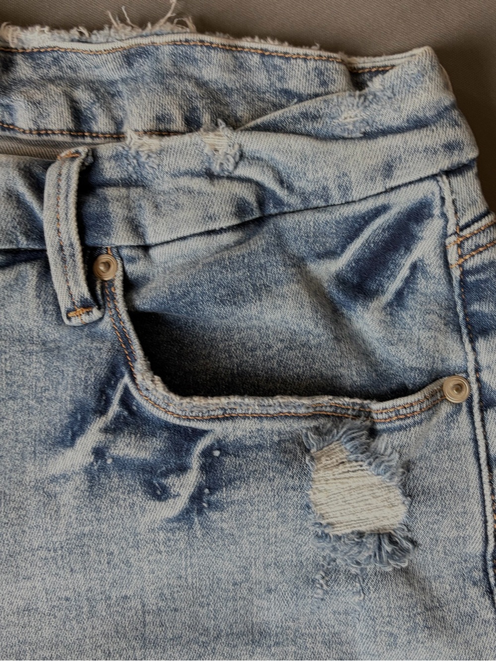 Good American Light Blue High-Rise Distressed Jeans